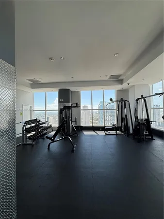 a view of a room with gym equipment