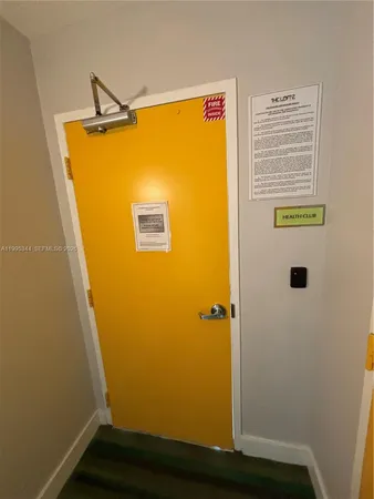 a bathroom with a shower and a mirror