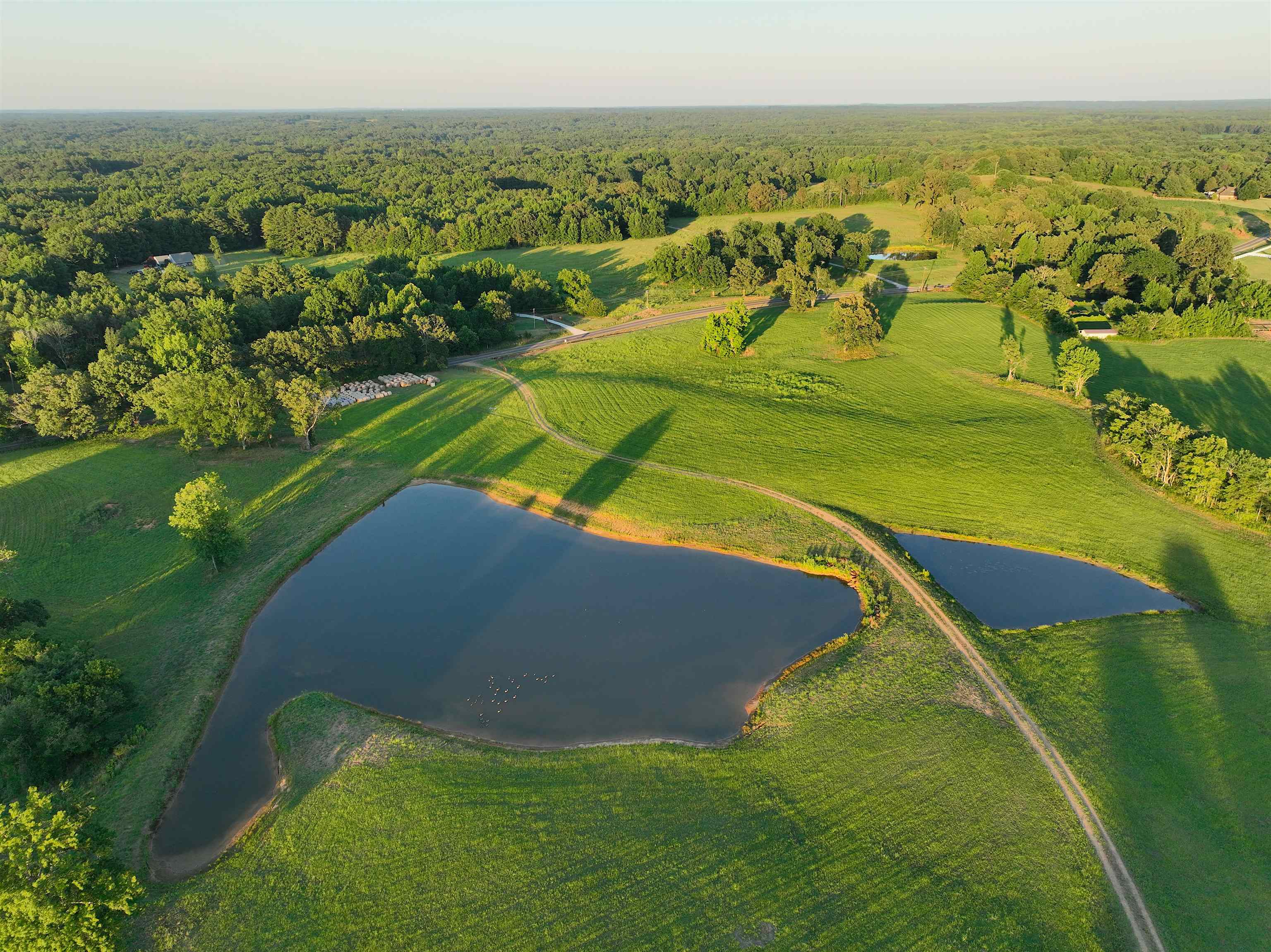 2143 South Slayden Road Lamar, MS 38642 - Photo 23 of 34 Drone / aerial view featuring a water view