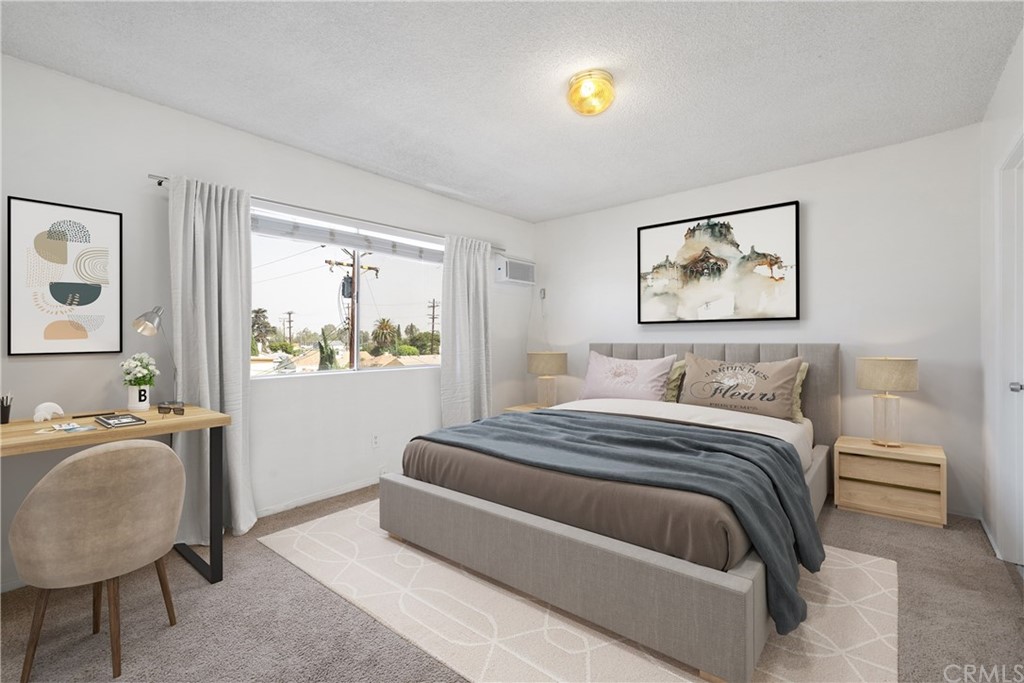 331 South New Avenue, Unit H Monterey Park, CA 91755 - Photo 13 of 26 a bedroom with a bed and window