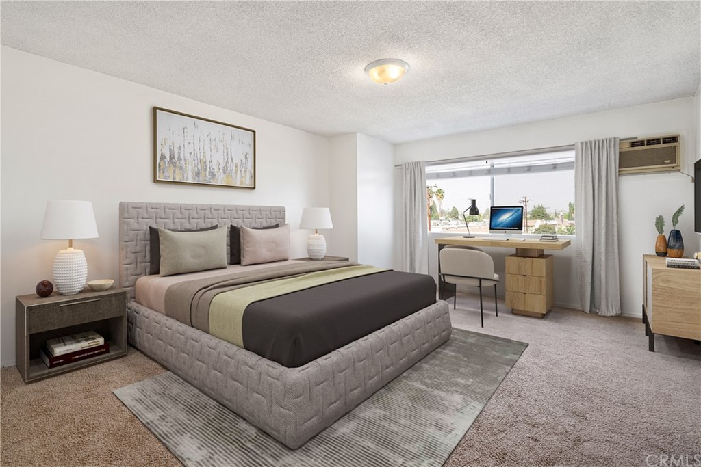 331 South New Avenue, Unit H Monterey Park, CA 91755 - Photo 16 of 26 a bedroom with a bed and a large window