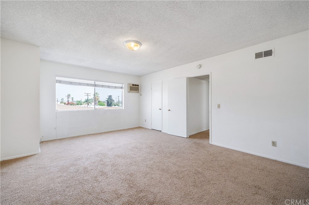 331 South New Avenue, Unit H Monterey Park, CA 91755 - Photo 17 of 26 a view of an empty room with a window