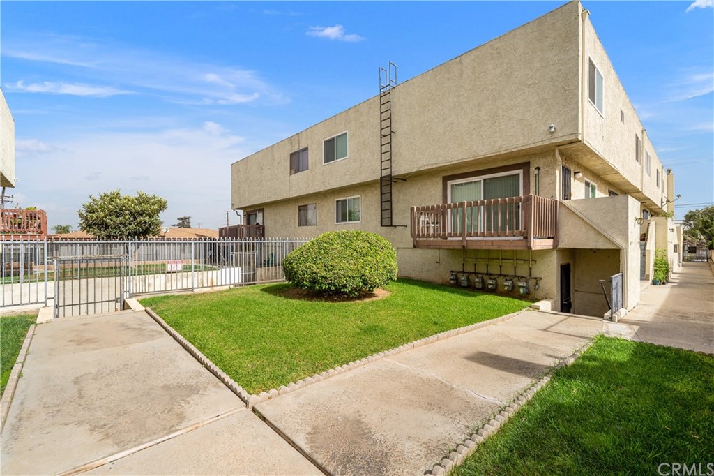 331 South New Avenue, Unit H Monterey Park, CA 91755 - Photo 23 of 26 a view of a house with a yard