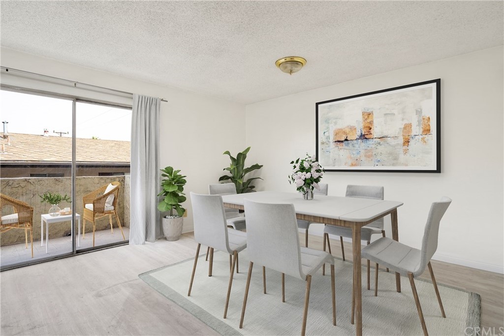 331 South New Avenue, Unit H Monterey Park, CA 91755 - Photo 5 of 26 a view of a livingroom with furniture and a potted plant