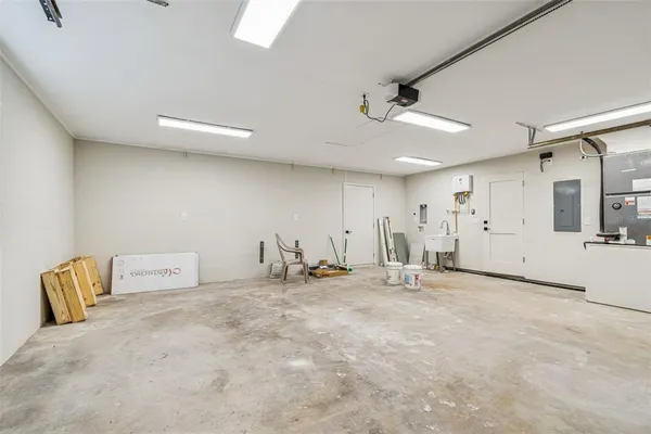 an aerial view of a city with lawn chairs