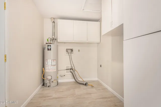 a view of a room with rack and white walls