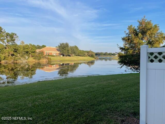 1500 Calming Water Drive, Unit 4502 Orange Park, FL 32003 - Photo 2 of 9 a view of a lake with houses in the back