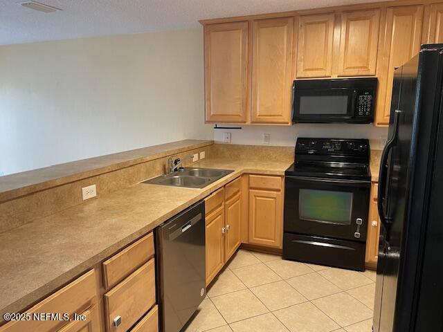 1500 Calming Water Drive, Unit 4502 Orange Park, FL 32003 - Photo 4 of 9 a kitchen with a stove and a microwave
