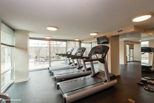800 Elgin Road, Unit 519 Evanston, IL 60201 - Photo 13 of 17 a view of a room with gym equipment