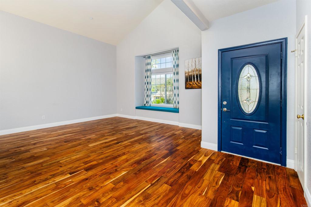 24427 Novato Place Ramona, CA 92065 - Photo 13 of 54 a bedroom with a bed and a dresser