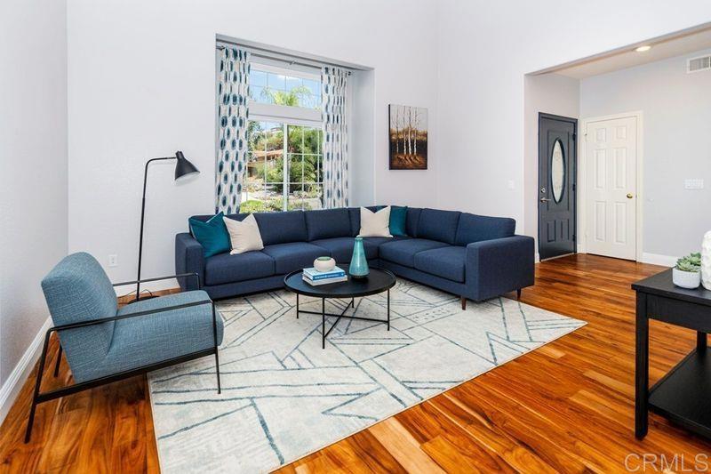 24427 Novato Place Ramona, CA 92065 - Photo 15 of 54 a living room with furniture and a window