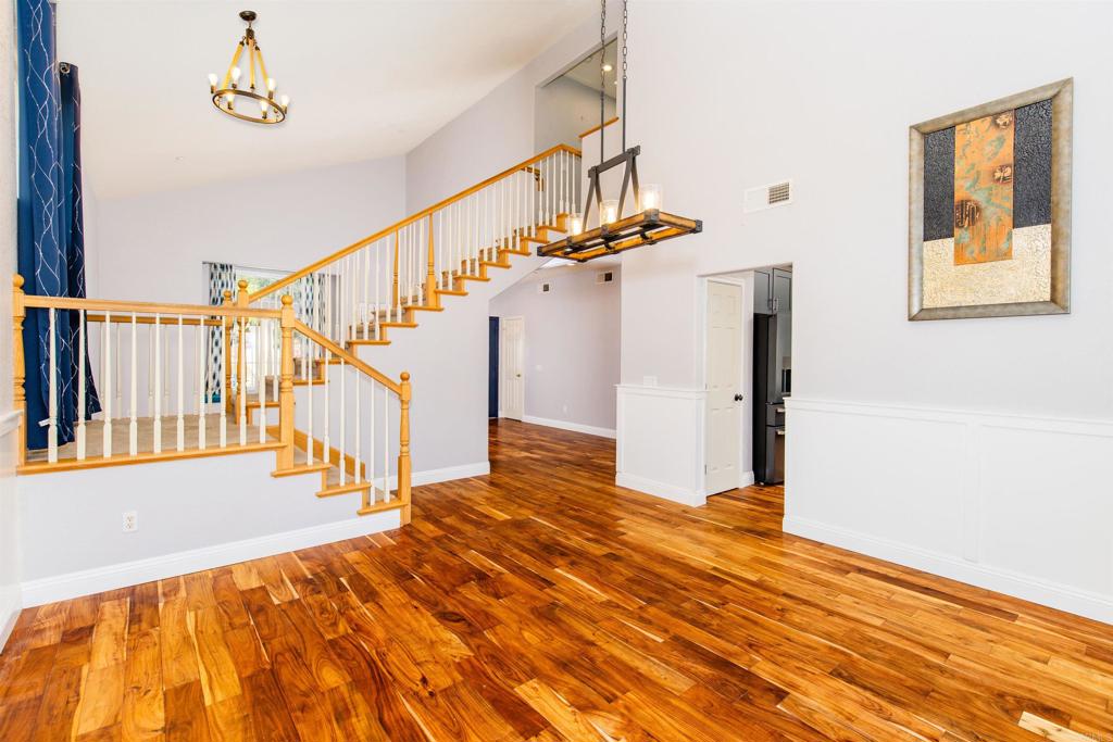 24427 Novato Place Ramona, CA 92065 - Photo 20 of 54 a view of entryway and hall with wooden floor
