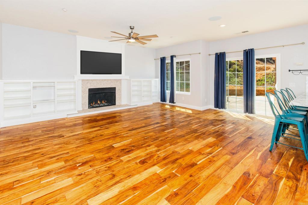 24427 Novato Place Ramona, CA 92065 - Photo 28 of 54 a view of a livingroom with furniture and a fireplace