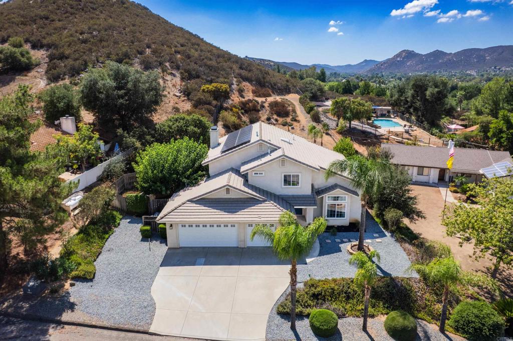24427 Novato Place Ramona, CA 92065 - Photo 3 of 54 an aerial view of a house