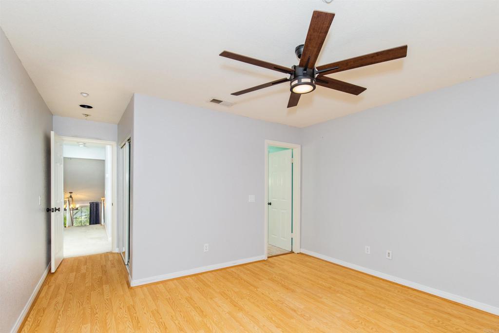24427 Novato Place Ramona, CA 92065 - Photo 48 of 54 a view of a room with a ceiling fan