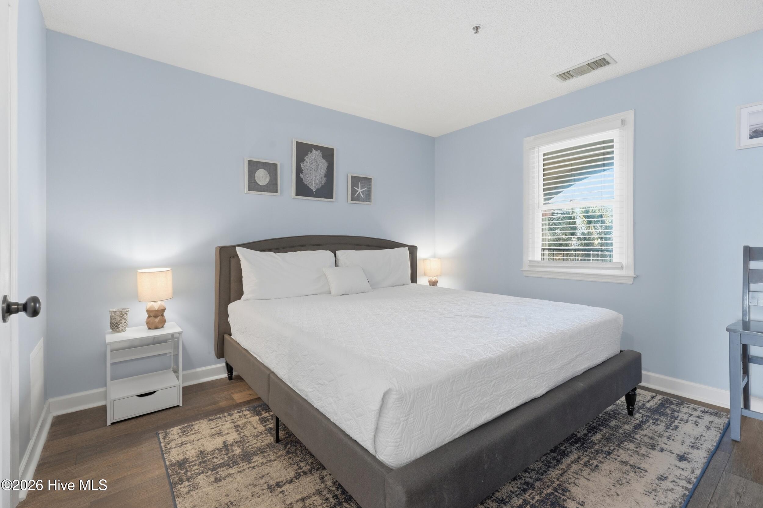 790 New River Inlet Road, Unit 114A North Topsail Beach, NC 28460 - Photo 18 of 37 28_primary bedroom