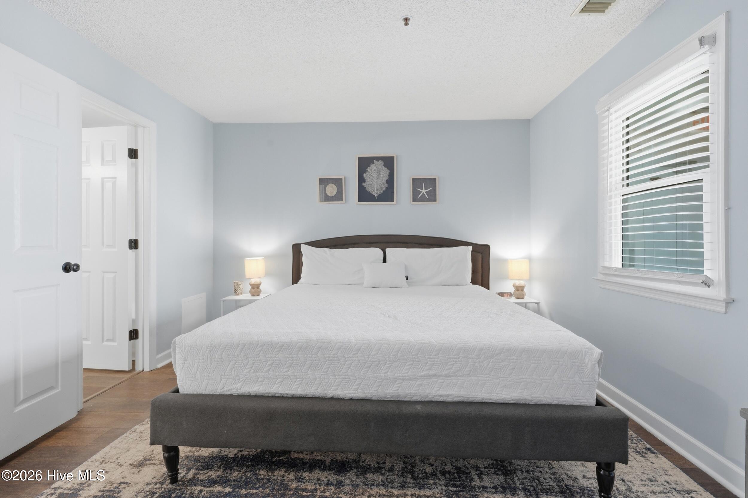 790 New River Inlet Road, Unit 114A North Topsail Beach, NC 28460 - Photo 21 of 37 31_primary bedroom