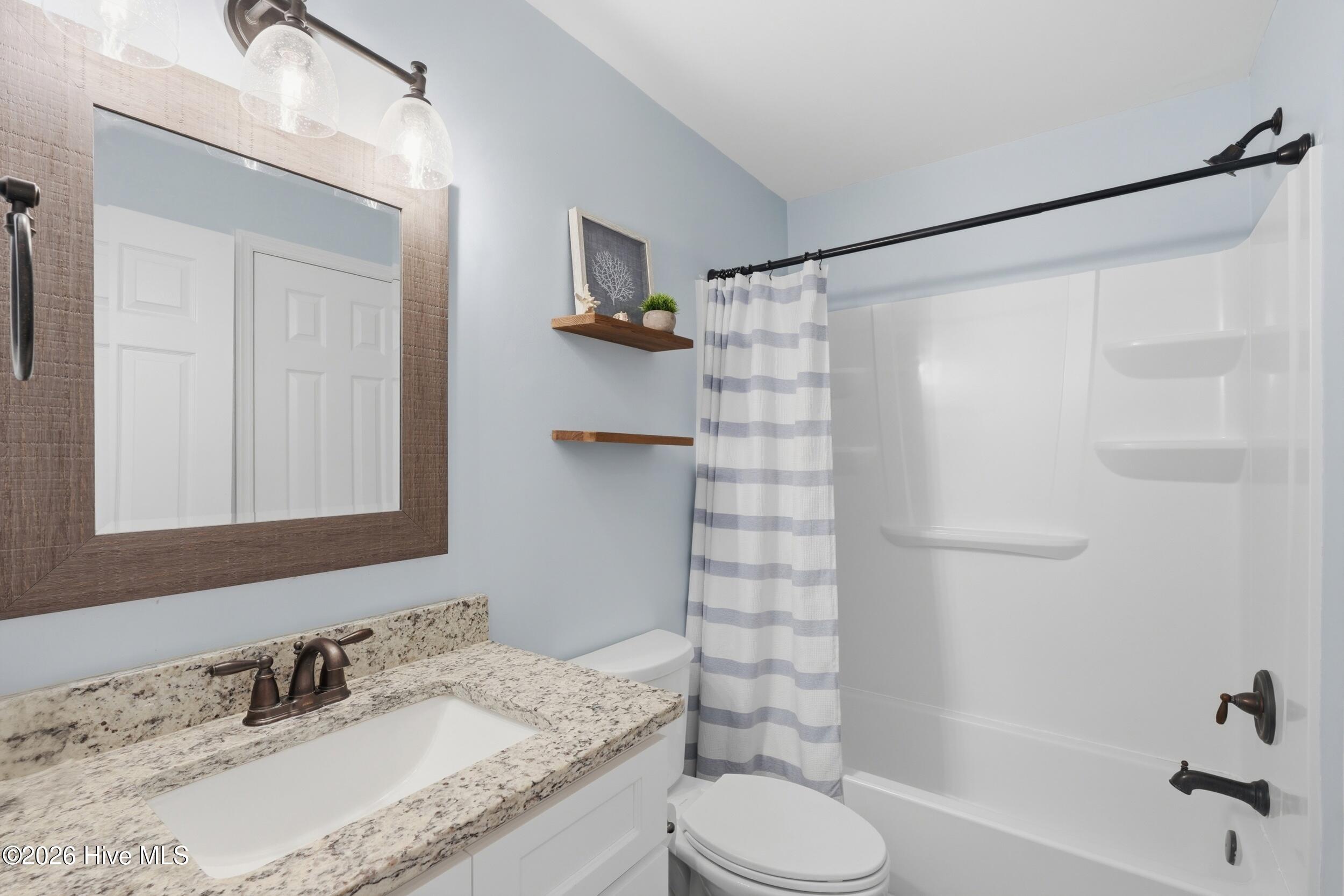 790 New River Inlet Road, Unit 114A North Topsail Beach, NC 28460 - Photo 24 of 37 34_primary bathroom