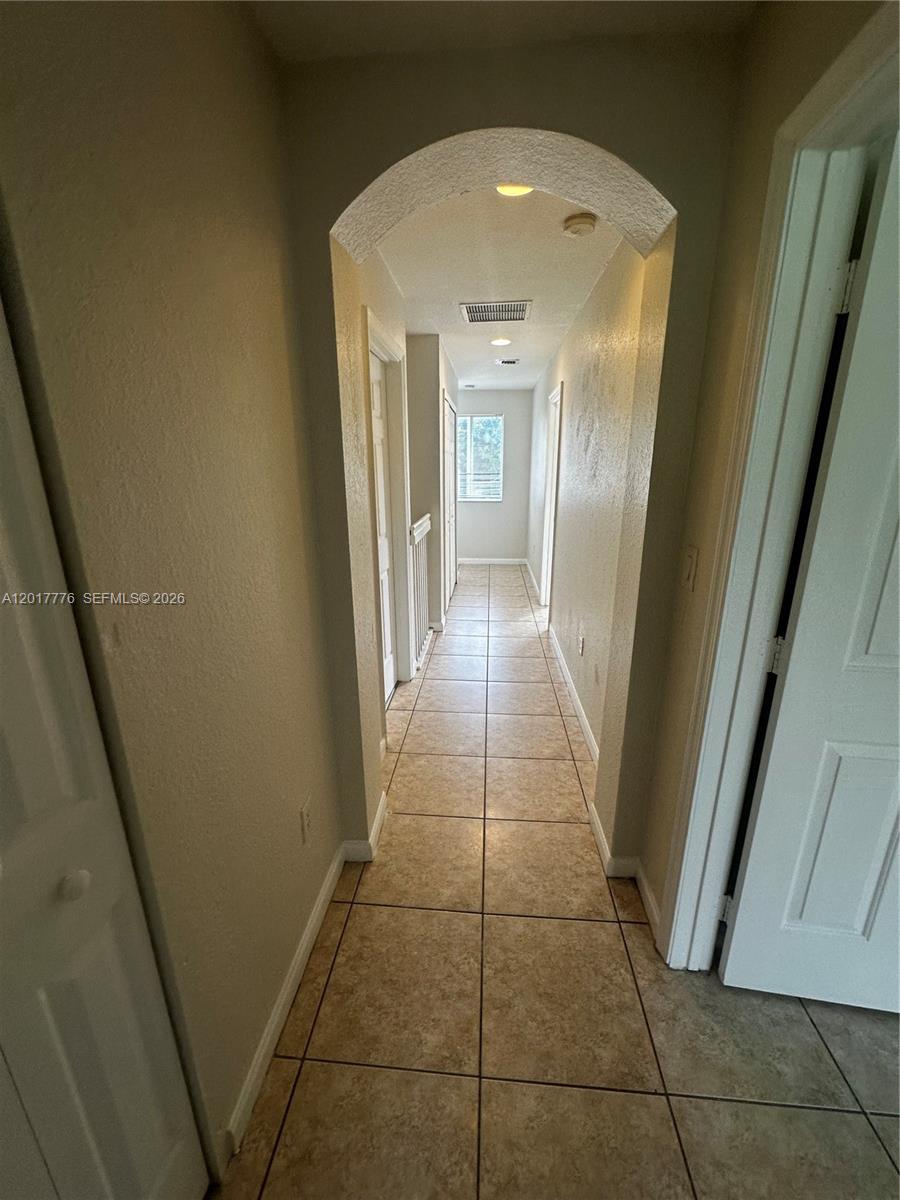 2907 Southeast 15th Road, Unit 67 Homestead, FL 33035 - Photo 22 of 25 a view of a hallway