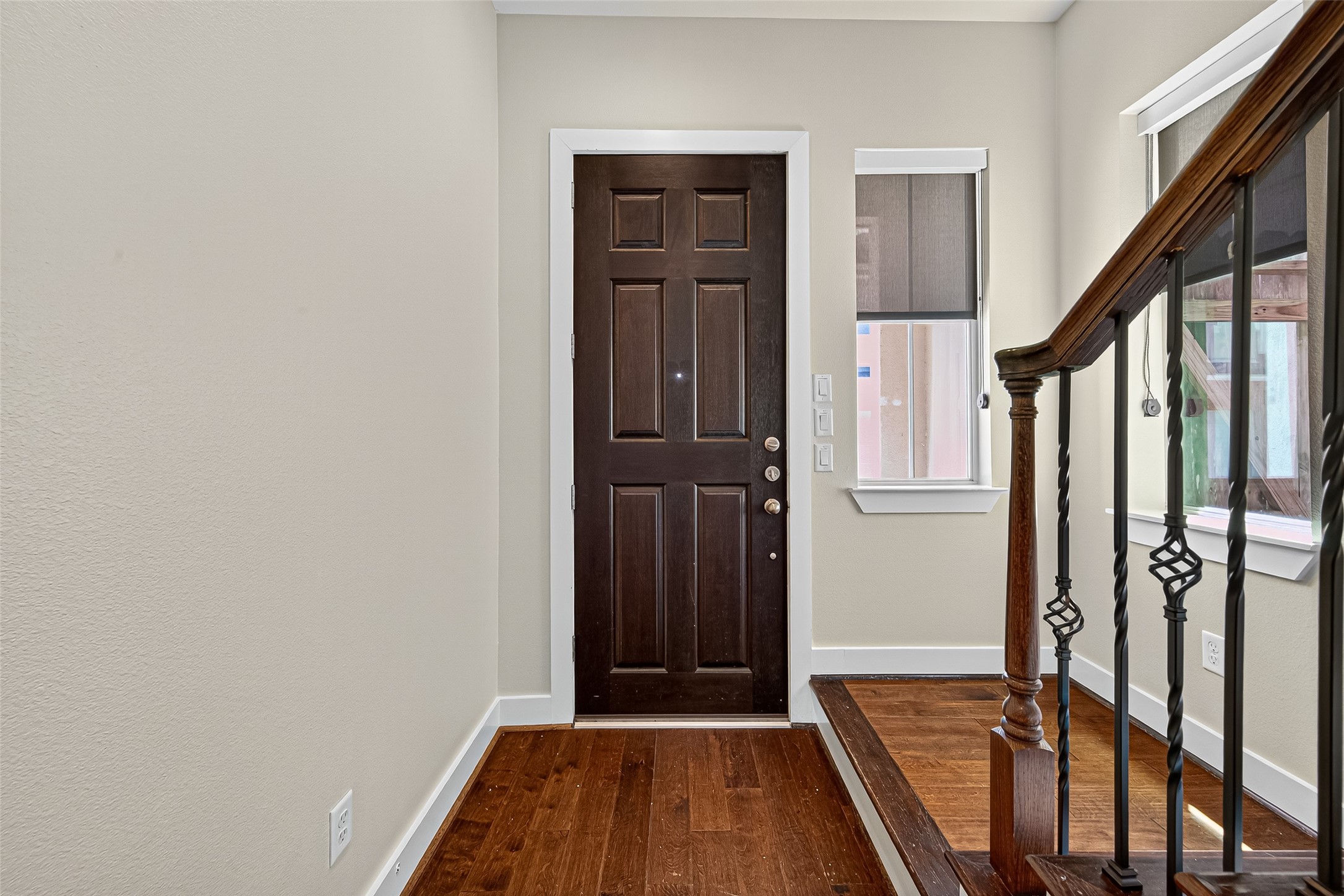 9508 Cedarpost Square Street Houston, TX 77055 - Photo 2 of 30 a view of front door with wooden floor