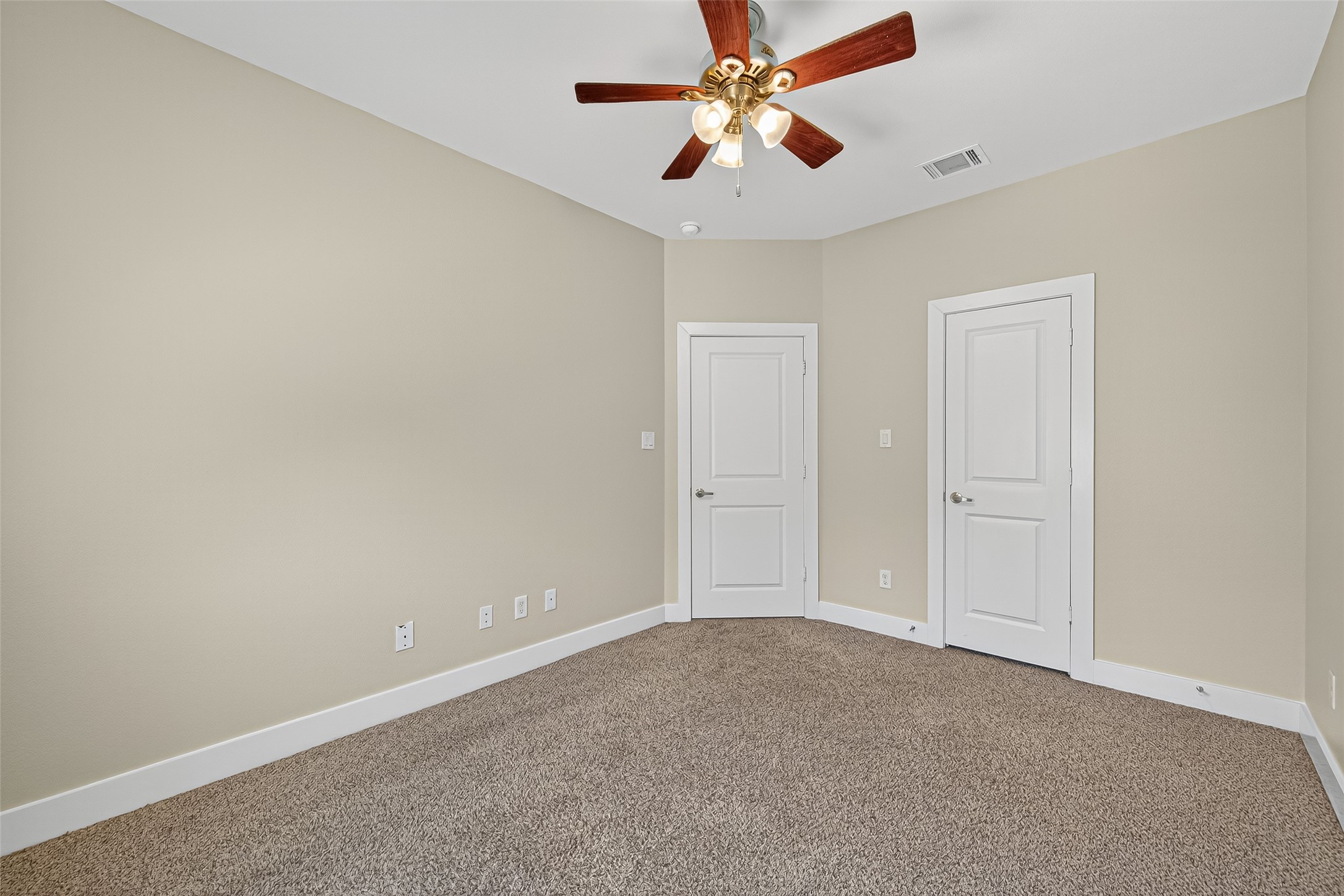 9508 Cedarpost Square Street Houston, TX 77055 - Photo 22 of 30 an empty room with a fan and a fan