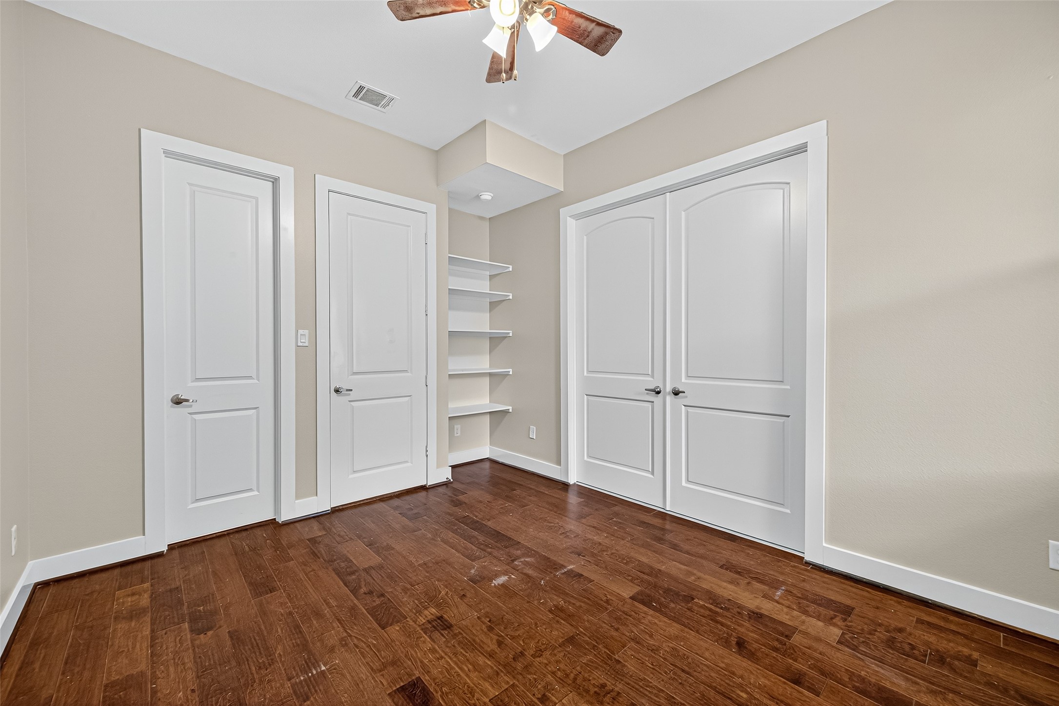 9508 Cedarpost Square Street Houston, TX 77055 - Photo 23 of 30 a view of empty room with wooden floor