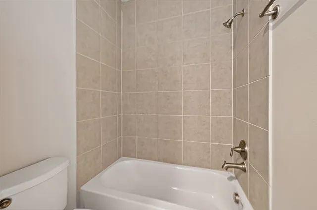 a view of house with porch and wooden floor