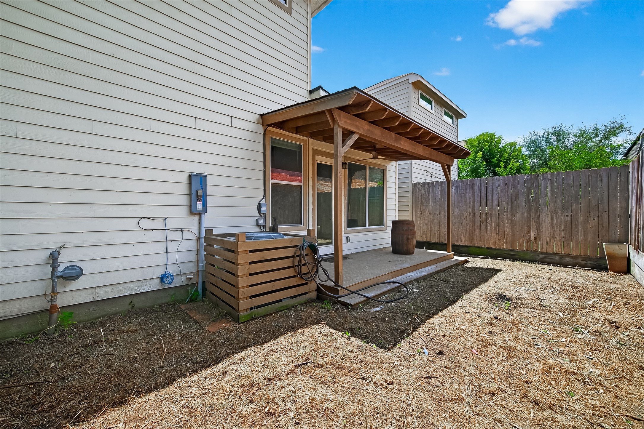 9508 Cedarpost Square Street Houston, TX 77055 - Photo 27 of 30 a view of a house with backyard and wooden fence