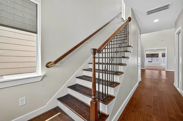 a view of entryway with wooden floor