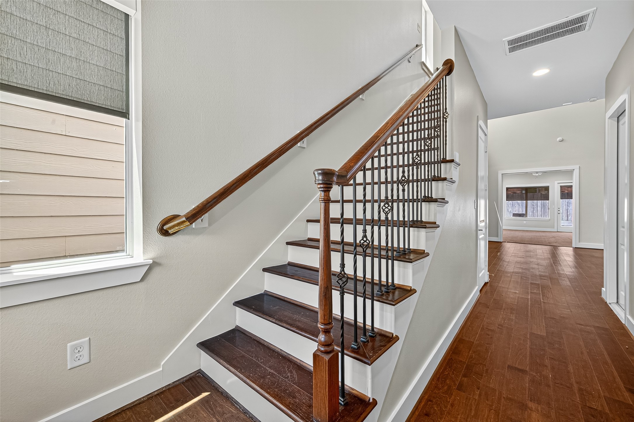 9508 Cedarpost Square Street Houston, TX 77055 - Photo 3 of 30 a view of entryway with wooden floor