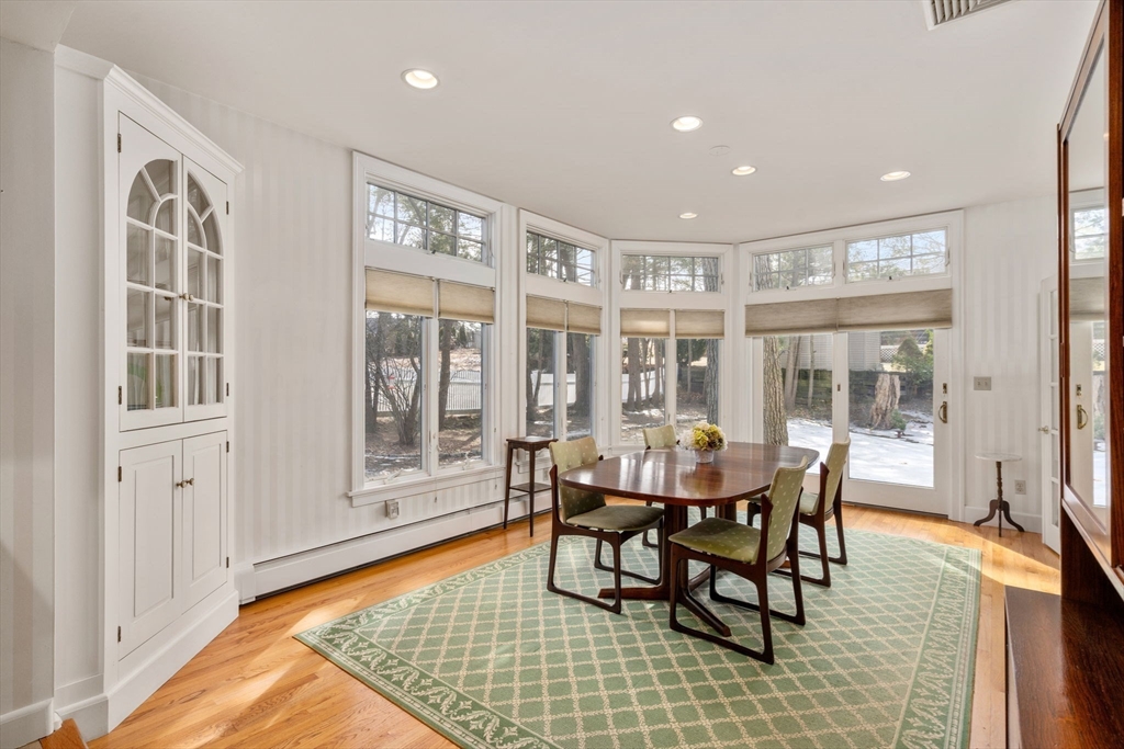 6 Earle Road Wellesley, MA 02481 - Photo 11 of 33 a dining room with furniture and wooden floor