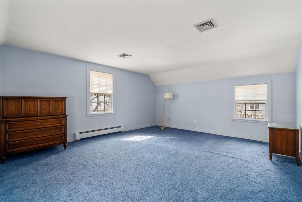 6 Earle Road Wellesley, MA 02481 - Photo 18 of 33 an empty room with windows