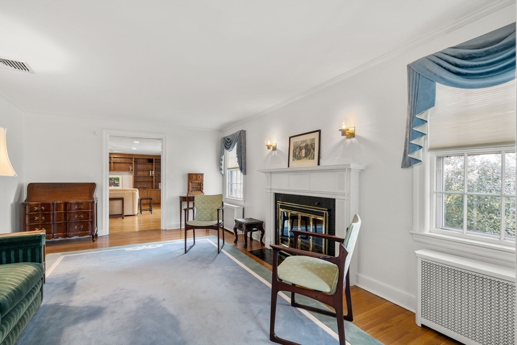 6 Earle Road Wellesley, MA 02481 - Photo 2 of 33 a living room with furniture and a fireplace