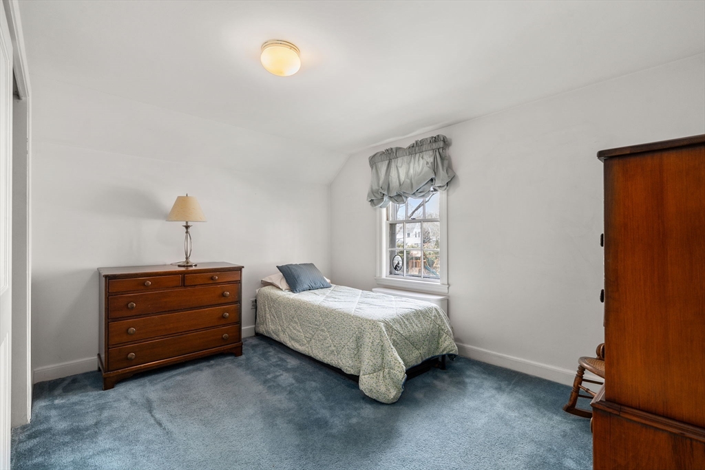 6 Earle Road Wellesley, MA 02481 - Photo 22 of 33 a bedroom with a bed and a window