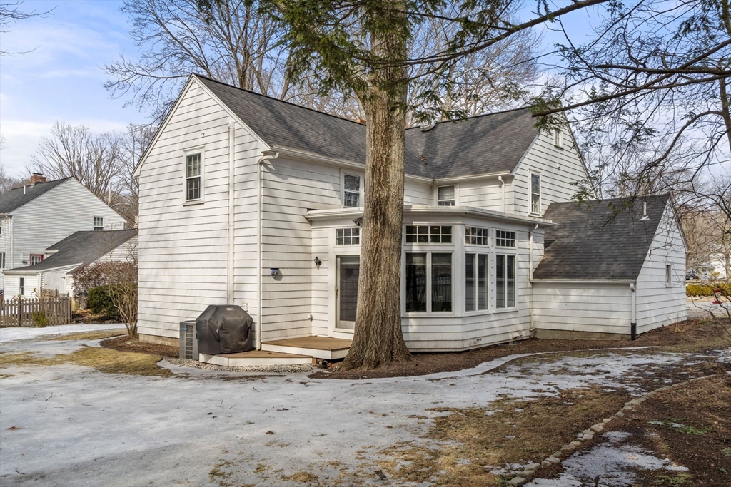 6 Earle Road Wellesley, MA 02481 - Photo 26 of 33 a front view of a house with a yard