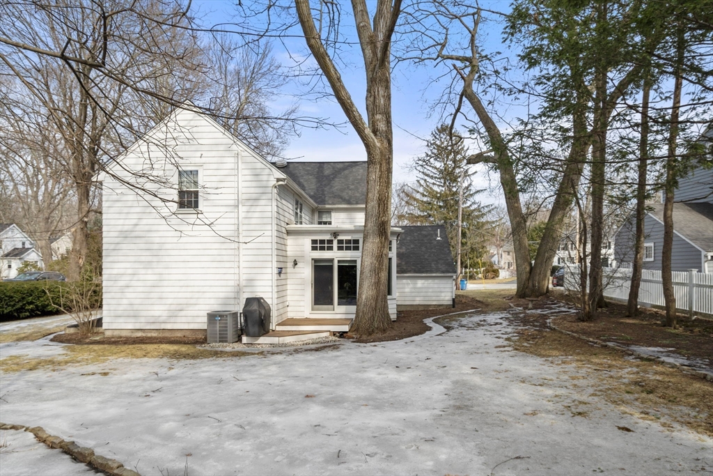 6 Earle Road Wellesley, MA 02481 - Photo 27 of 33 a view of a house with a yard and trees