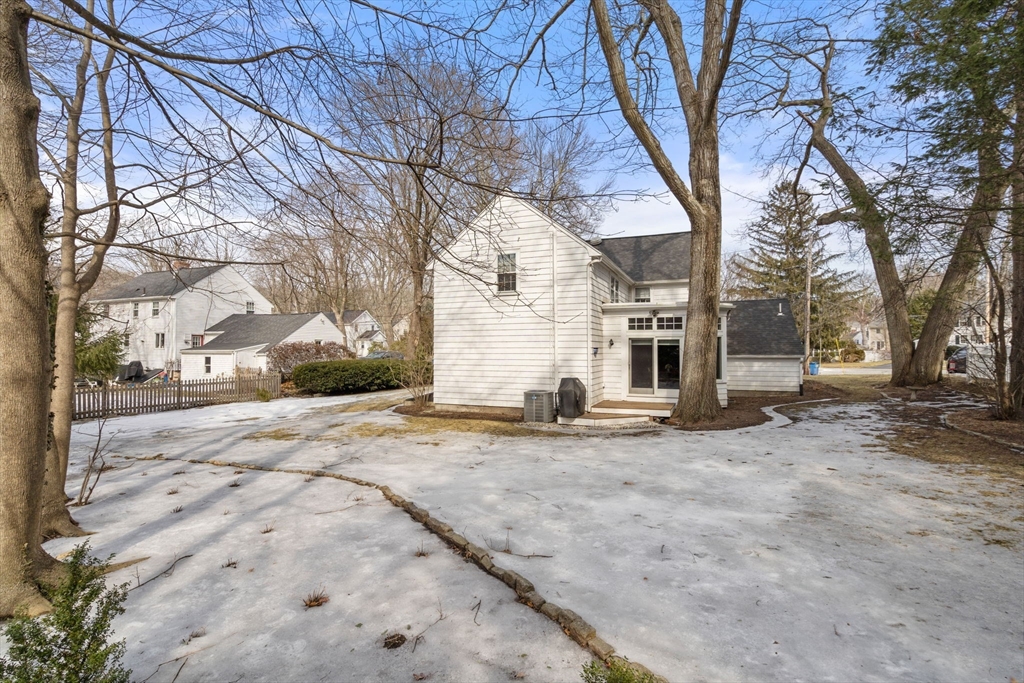 6 Earle Road Wellesley, MA 02481 - Photo 28 of 33 a view of a yard with brick house