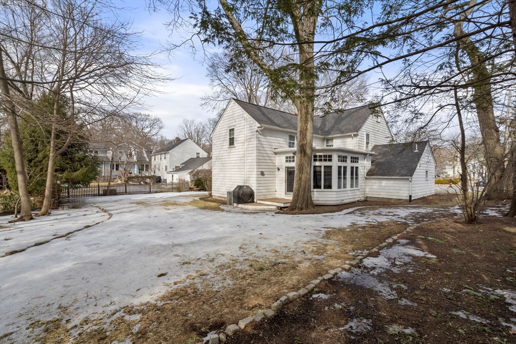 6 Earle Road Wellesley, MA 02481 - Photo 30 of 33 a view of a yard with a large tree