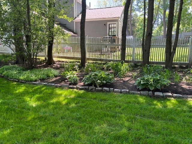 6 Earle Road Wellesley, MA 02481 - Photo 31 of 33 a view of a house with a backyard