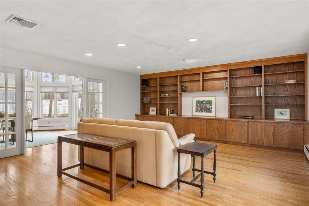 6 Earle Road Wellesley, MA 02481 - Photo 6 of 33 a living room with furniture and a wooden floor