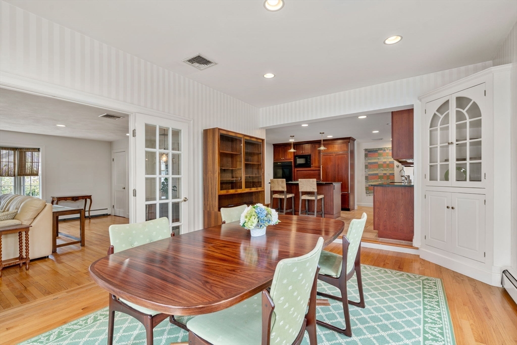 6 Earle Road Wellesley, MA 02481 - Photo 10 of 33 a view of a dining room with furniture window and wooden floor