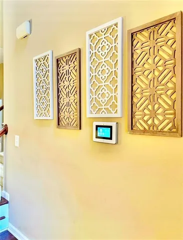 a wall painting on the wall with a bathroom