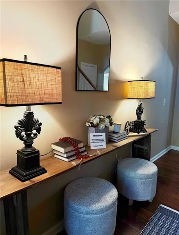 a work room with furniture and wooden floor