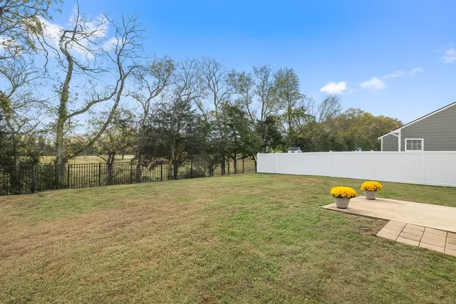 a view of house with garden