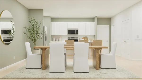 a living room with furniture a dining table and chairs