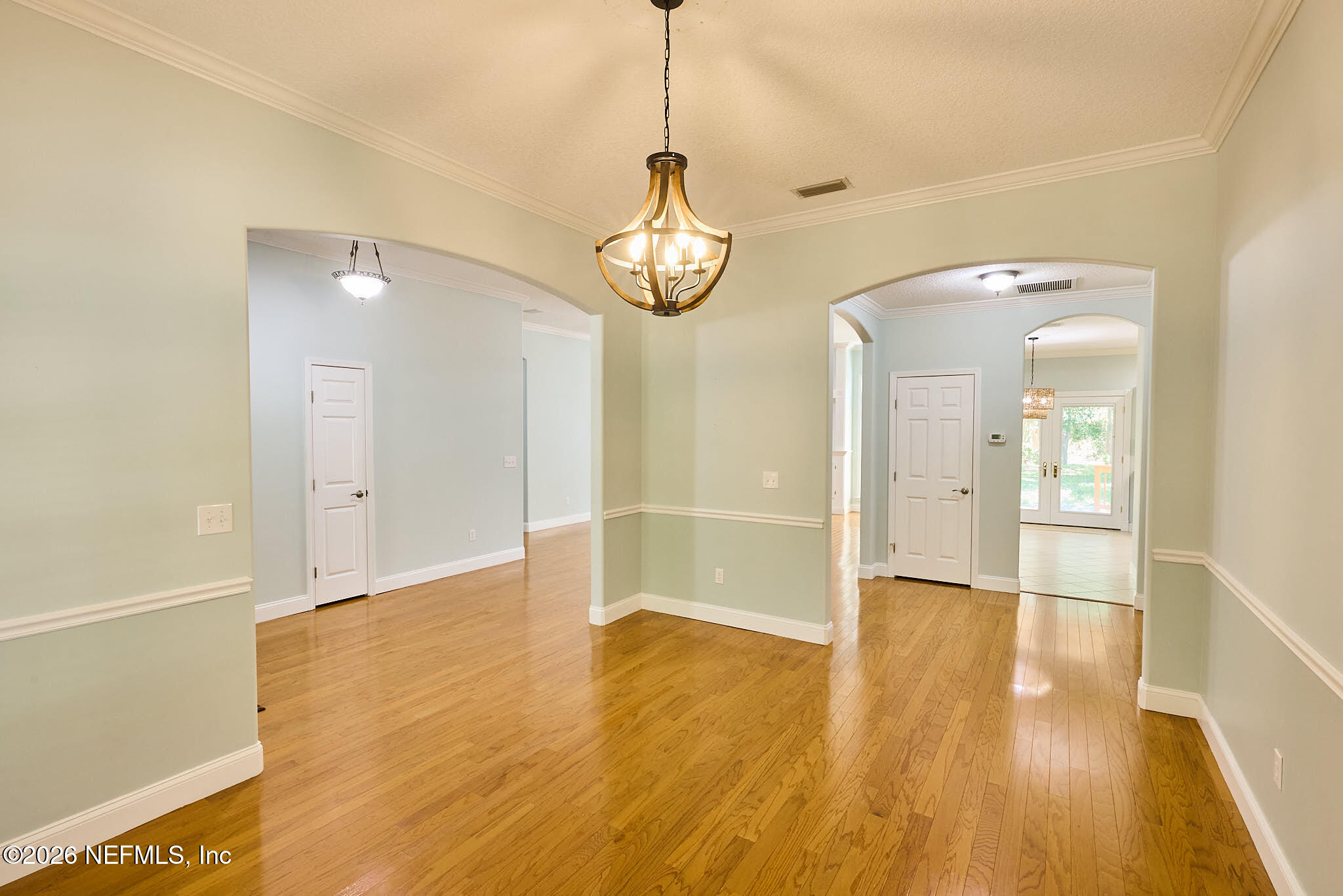 85404 Burmeister Road Fernandina Beach, FL 32034 - Photo 39 of 53 a view of empty room with wooden floor and fan