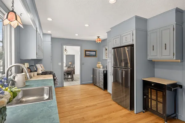 a bedroom with a bed and a fireplace
