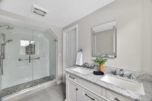 a bed room with a bed and a couch