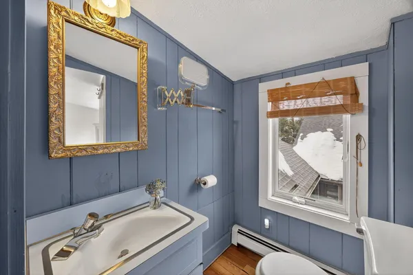 a living room with fireplace furniture and a flat screen tv