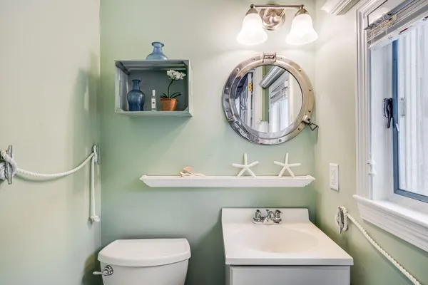 a living room filled with furniture and a table